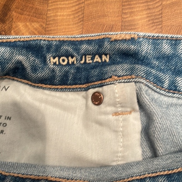 American Eagle Strigid Ripped Mom Jeans in Medium Wash - Picture 9 of 10